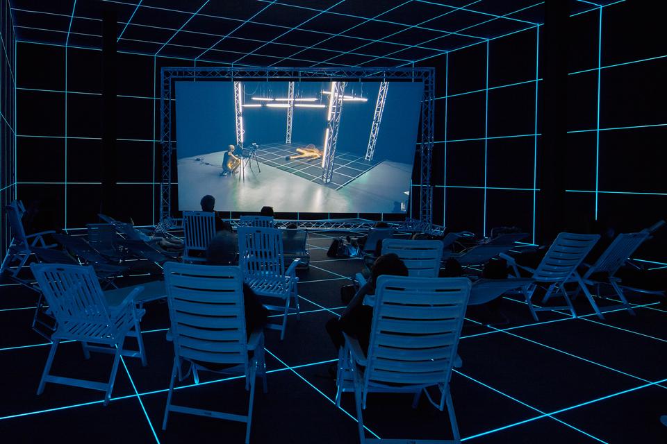 Installation view of Hito Steyerl, *Factory of the Sun*, 2015. Single-channel video and environment. San José Museum of Art. Purchased jointly by Museum of Contemporary Art, Chicago; San José Museum of Art; and Hammer Museum, Los Angeles, through the Board of Overseers Acquisitions Fund, 2017.08.