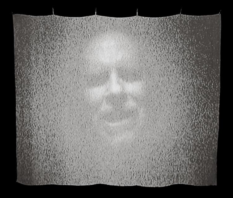 Video still from Bill Viola, *Memoria*, 2000. Projection on silk, 24 x 30 x 60 inches.